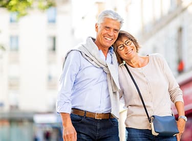 Couple smiling outdoors